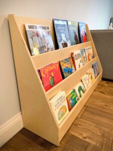 Display case for children's books.  Built to withstand toddlers.  Doubles as a climbing wall (just kidding).